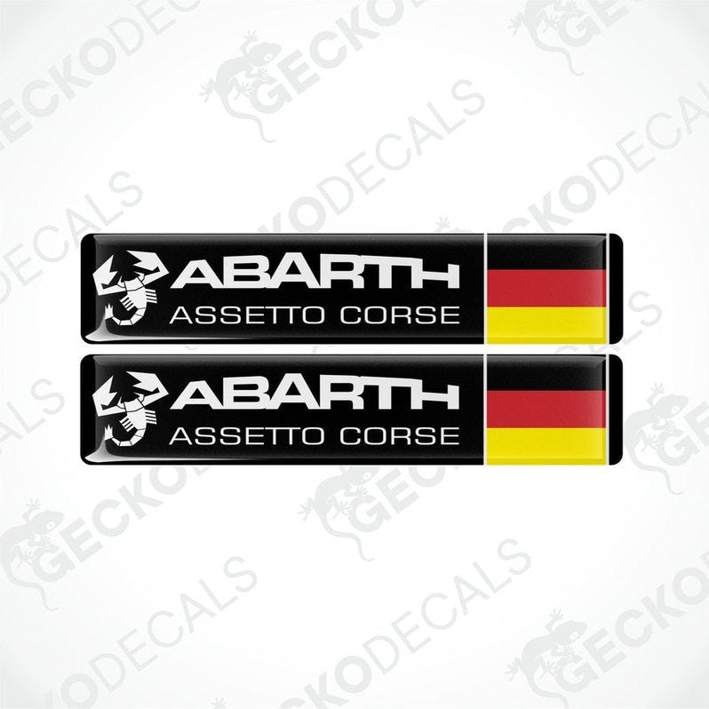 Two vinyl decals with a polyurethane coating featuring the Abarth Assetto Corse logo and the German flag.