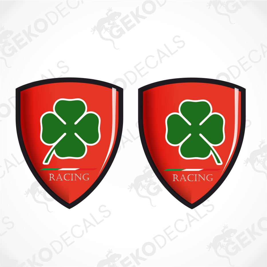 Two identical red shield-shaped decals with a green four-leaf clover and the text 'GEKODE RACING' on a light gray background with faint watermarks.