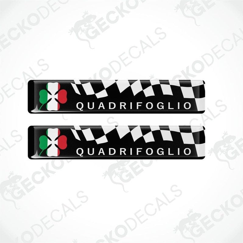 Two vinyl stickers with a checkered pattern and the word 'QUADRIFOGLIO' written on them, against a white background.