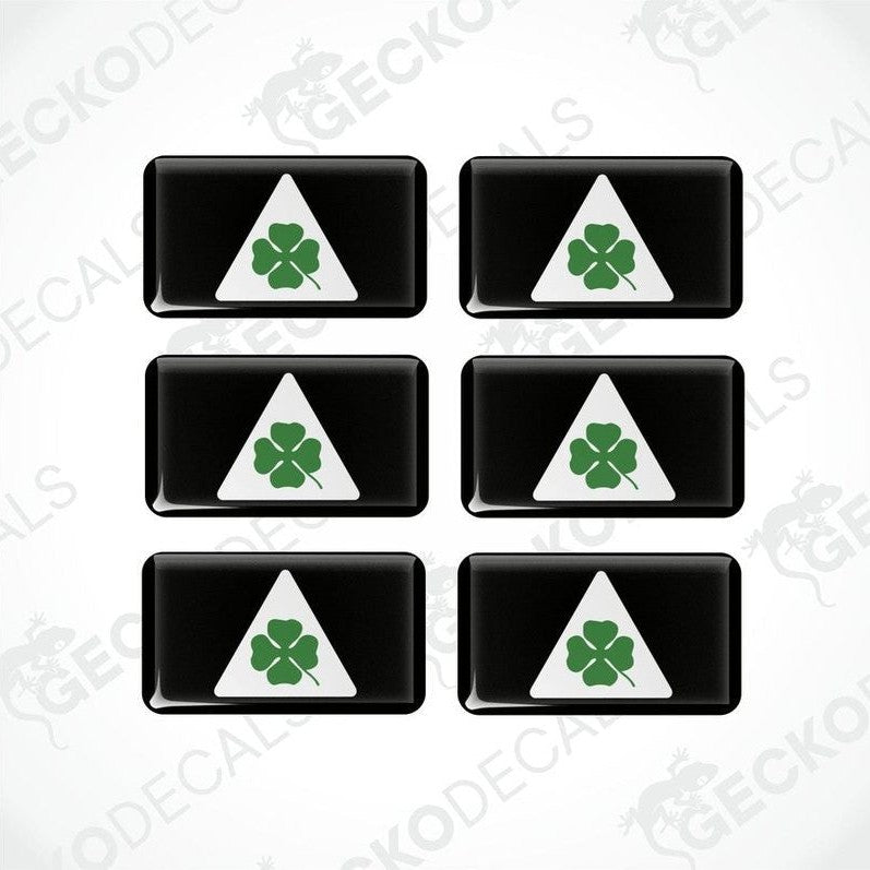Set of six black, white, and green car decals with a four-leaf clover design, intended for use on a vehicle.