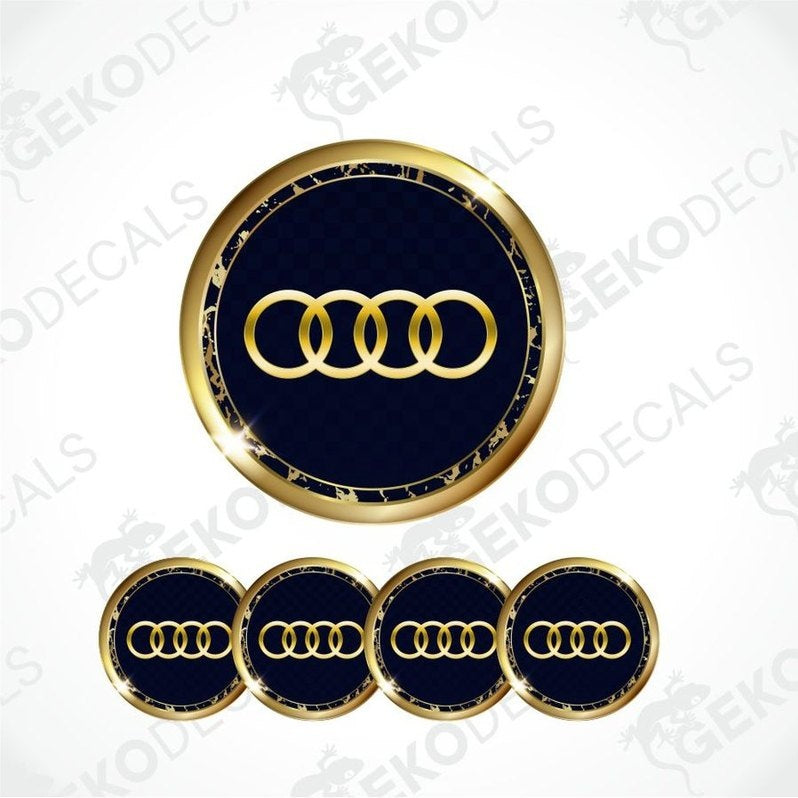 Audi logo decal set with gold rim on a white background