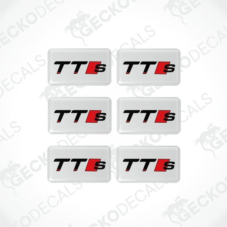 A set of six white, red, and black vinyl decals with the 'TT S' logo.