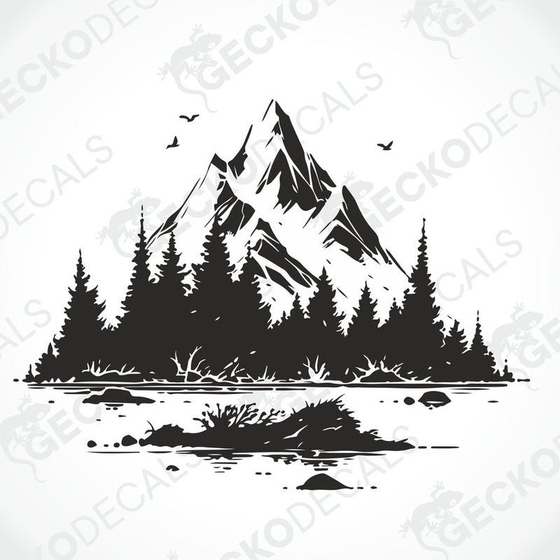A die cut decal of a mountain scenery with trees and birds, intended for use on vehicles or other surfaces, displayed on a white background.