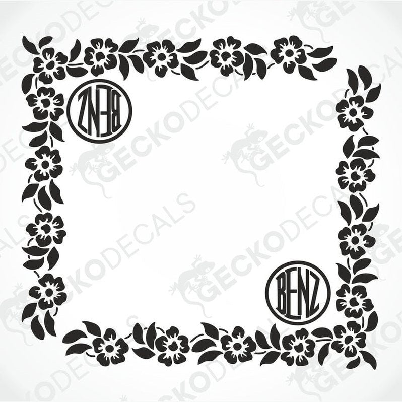 A black floral side window decal with the Mercedes-Benz logo on it.