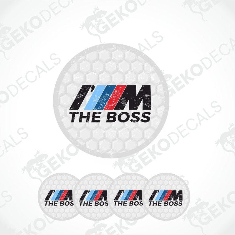 A set of four vinyl decals for a BMW vehicle, with the text 'THE BOSS' and the BMW logo in a white, red, and blue color scheme.