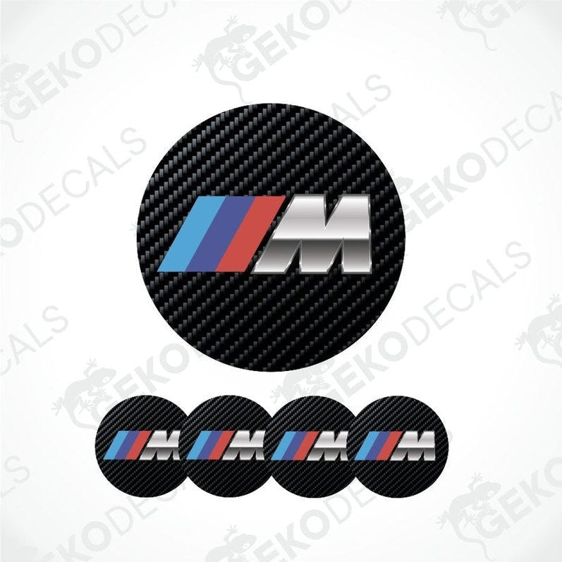 BMW M logo decal with carbon fiber texture on a white background