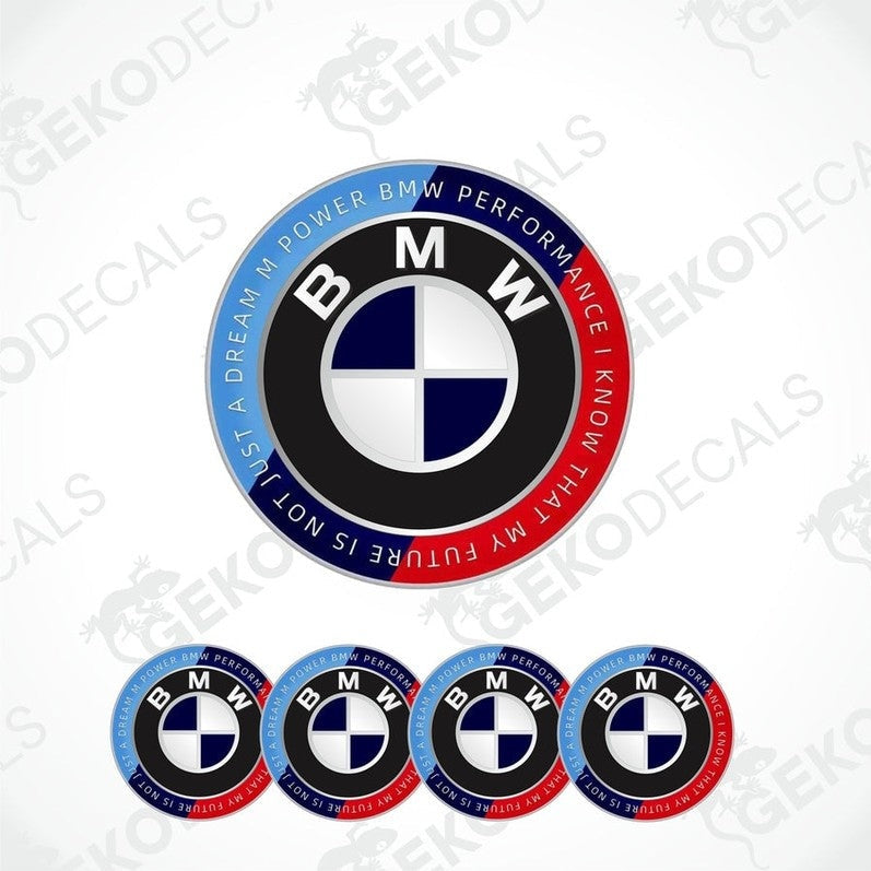 A set of round BMW M POWER PERFORMANCE vinyl decals with a central emblem and blue and red accents around the text.