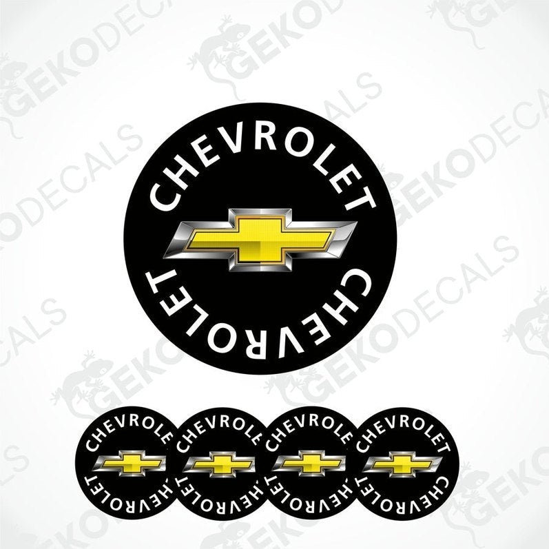 A set of vinyl decals with the Chevrolet logo, including one large emblem and four smaller ones, with a black background and yellow and silver detailing.