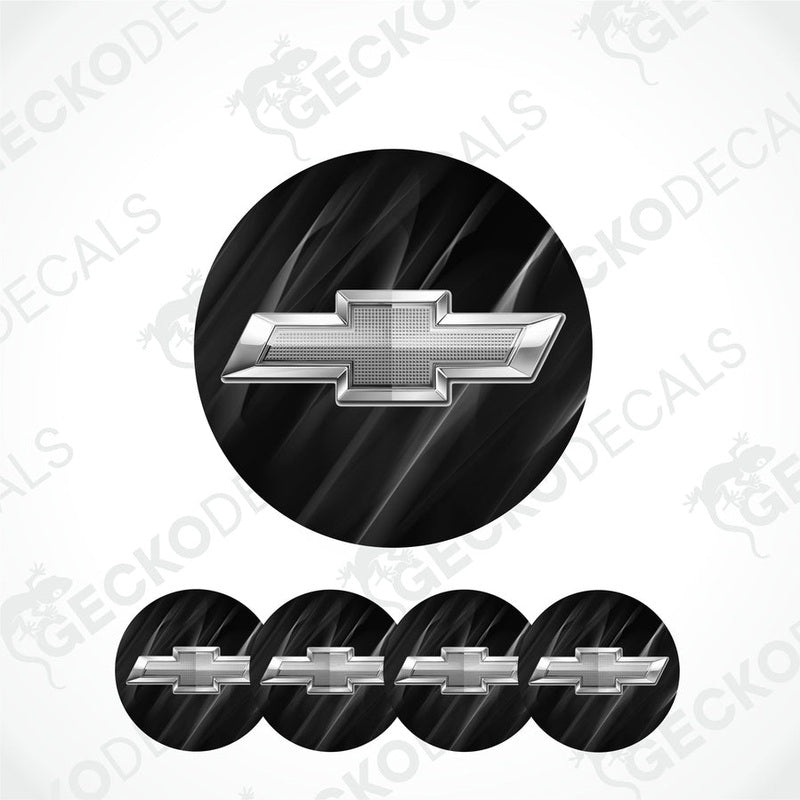 3D silver metallic Chevrolet logo on a black smoky background