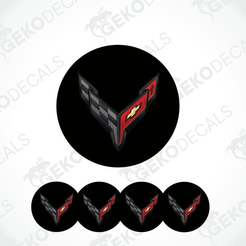 A set of four black vinyl stickers with a red and white geometric pattern design, resembling a car logo, displayed on a white background.
