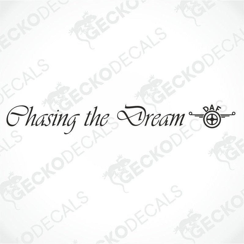 A die cut decal with the phrase 'Chasing the Dream' displayed on the front windscreen of a silver truck.