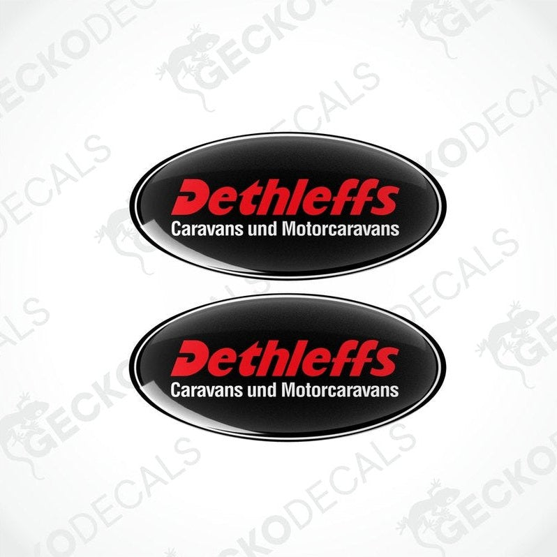 Two black, red, and white oval-shaped vinyl decals with the Dethleffs brand logo and text 'Caravans und Motorcaravans'.