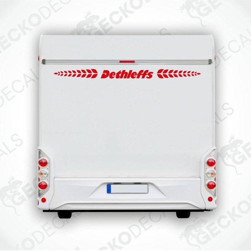 A white Dethleffs brand decal for a caravan, featuring the Dethleffs logo in red and white.