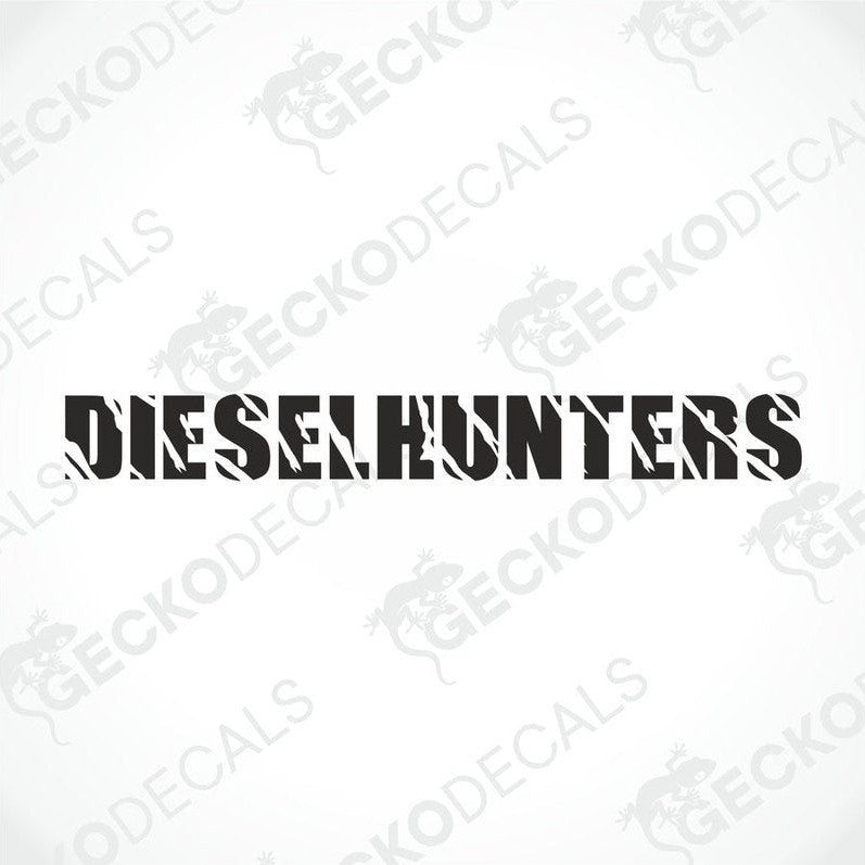 A gray truck with a 'DIESELHUNTERS' decal on its windscreen.
