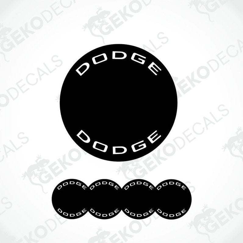 A set of black vinyl decals with the word 'DODGE' written in white letters, designed for use as car wheel caps or stickers.