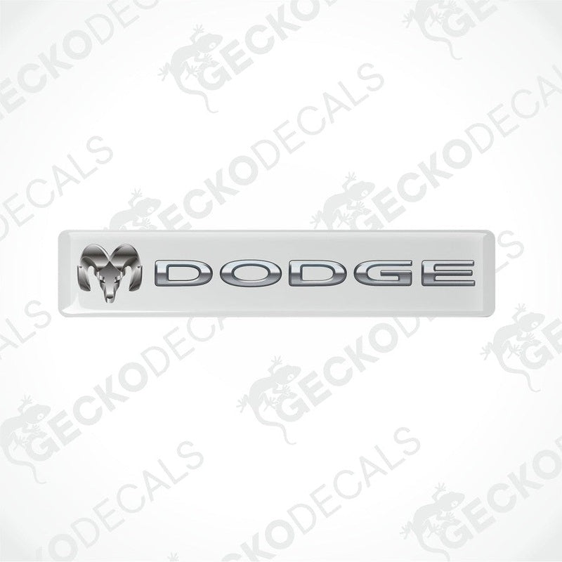 White vinyl stickers with the word 'Dodge' printed on them.