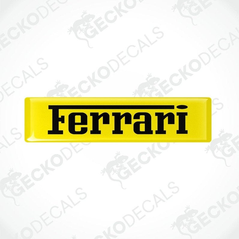 Yellow vinyl stickers with the FERRARI logo in black text.