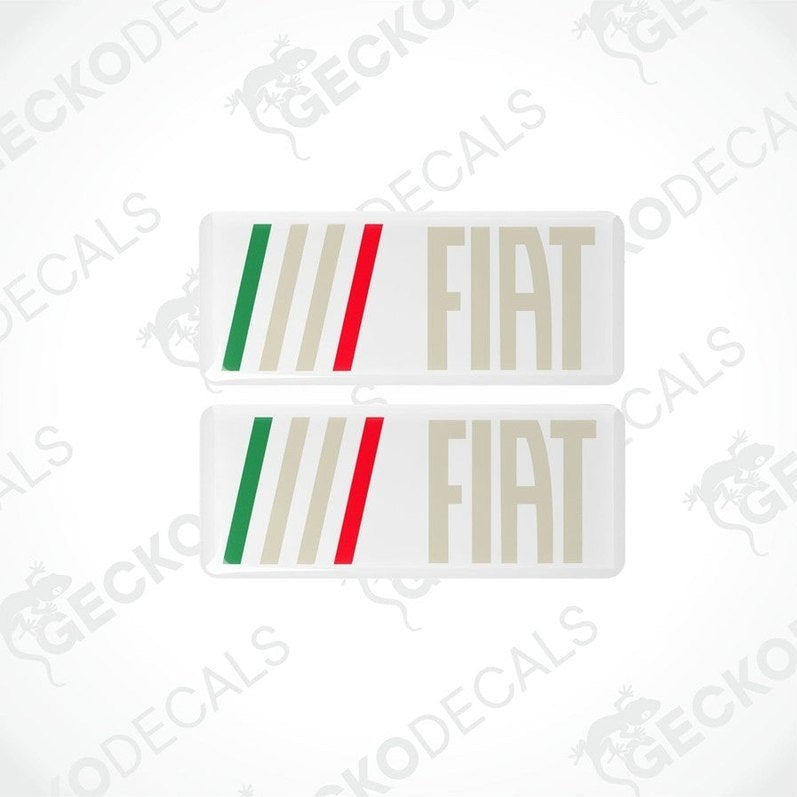 Two rectangular car decals with a geometric pattern and the brand name 'FIAT' written in capital letters.