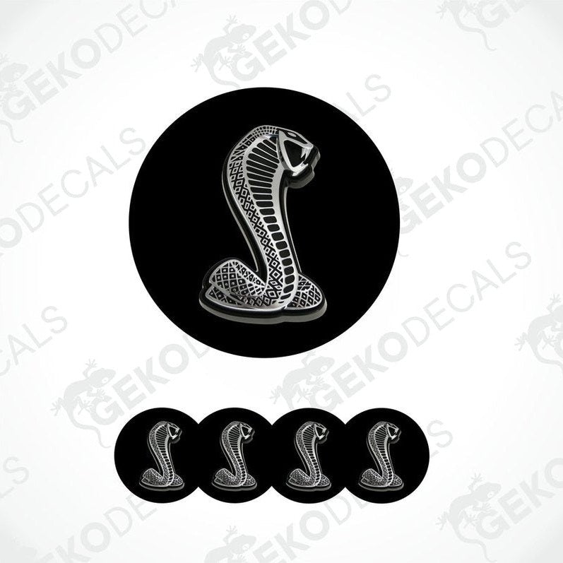 A set of black vinyl decals with a white cobra design, typically associated with the FORD SHELBY brand.