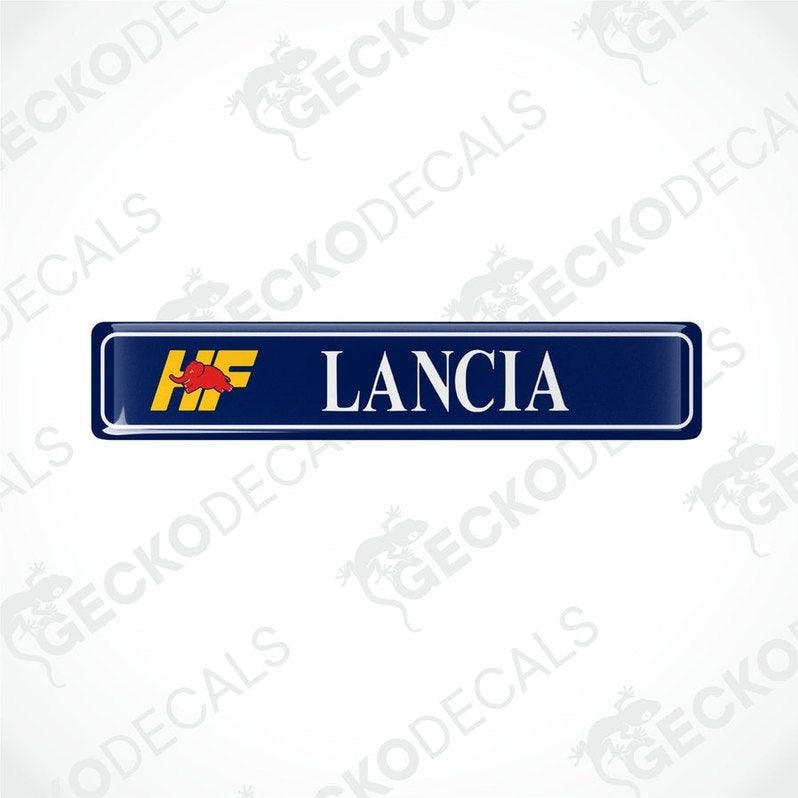 Two blue vinyl stickers with the text 'LANCIA' and the logo 'HF' in yellow and red.