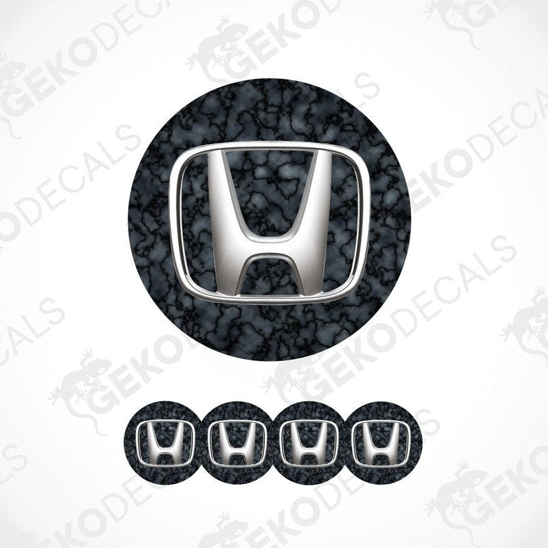 A set of vinyl decals with a polyurethane coating featuring the HONDA logo, displayed on a white background.