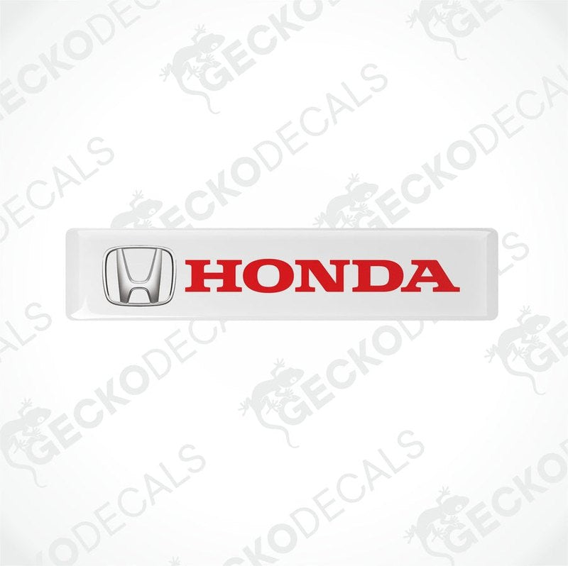 White vinyl stickers with the Honda logo in red and silver.