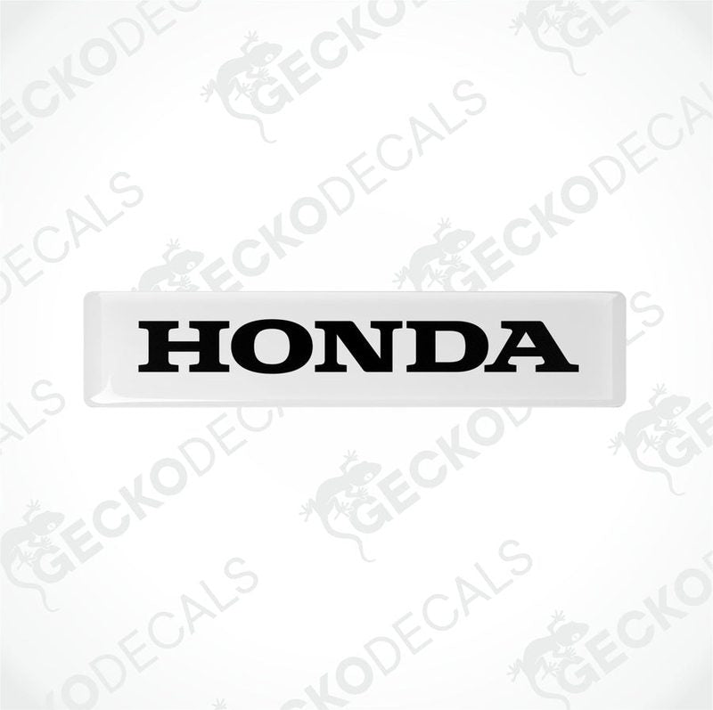 White and white rectangular car decals with the text 'HONDA' on them.