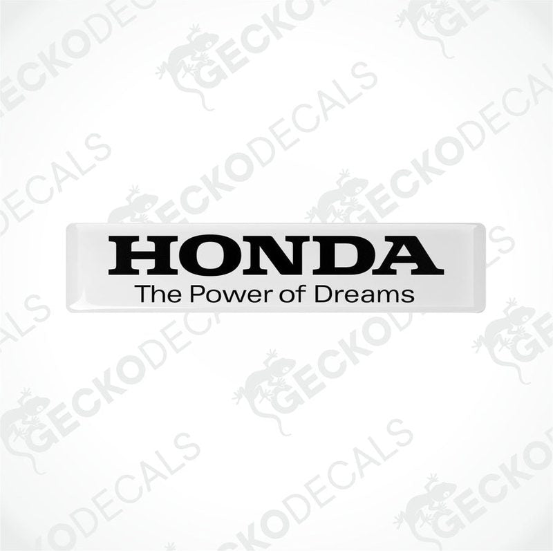 Rectangular white vinyl decals with black text that reads 'HONDA The Power of Dreams'.