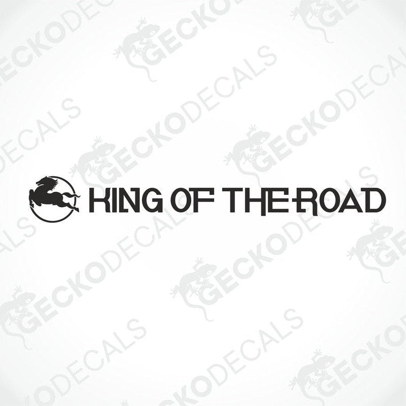 A front view of an IVECO truck with a windscreen decal reading 'KING OF THE ROAD'.