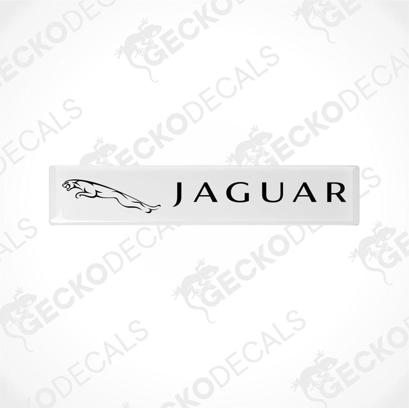 White rectangular car decals with the word 'JAGUAR' written on them in white lettering, along with the image of a jaguar in black.