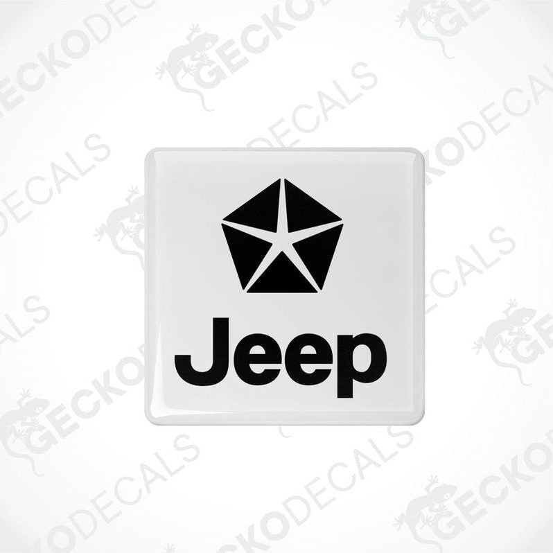 Withe vinyl stickers with a JEEP logo on them, placed against a black background.