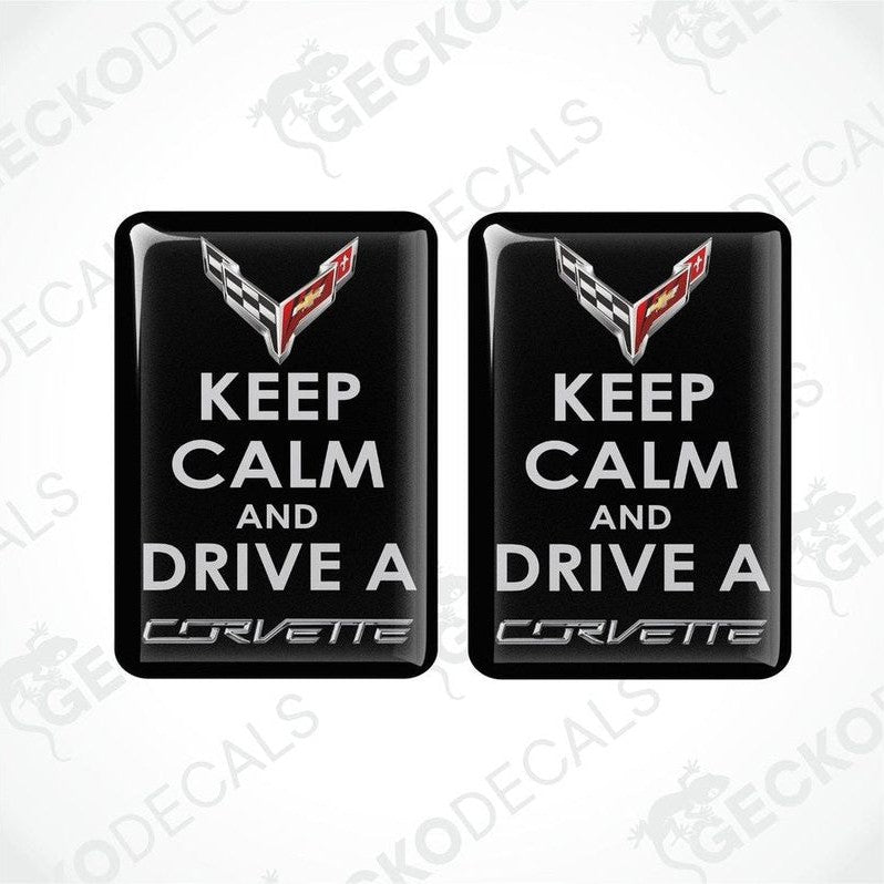 Two black vinyl stickers with the text 'KEEP CALM AND DRIVE A CORVETTE' and the Chevrolet Corvette logo.