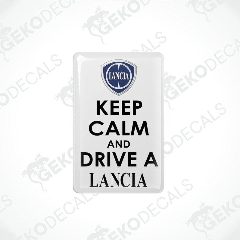 White vinyl decals with black text saying 'KEEP CALM AND DRIVE A LANCIA' and the Lancia logo above the text.