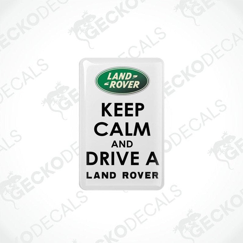 White vinyl stickers with the text 'KEEP CALM AND DRIVE A LAND ROVER' and the Land Rover logo.