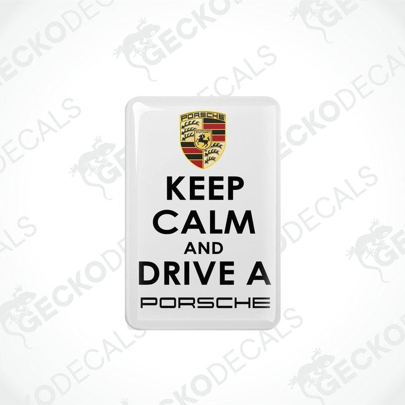 Withe vinyl decals with the text 'KEEP CALM AND DRIVE A PORSCHE' and the Porsche logo in black and
