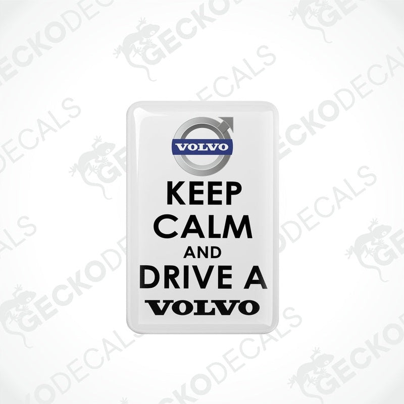Rectangular withe vinyl decals with white text and the Volvo brand logo, one decal reads 'KEEP CALM AND DRIVE A' and the other reads 'VOLVO'.