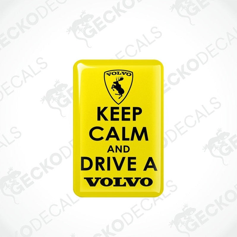 Yellow vinyl stickers with the text 'KEEP CALM AND DRIVE A VOLVO' and a Volvo logo on them.