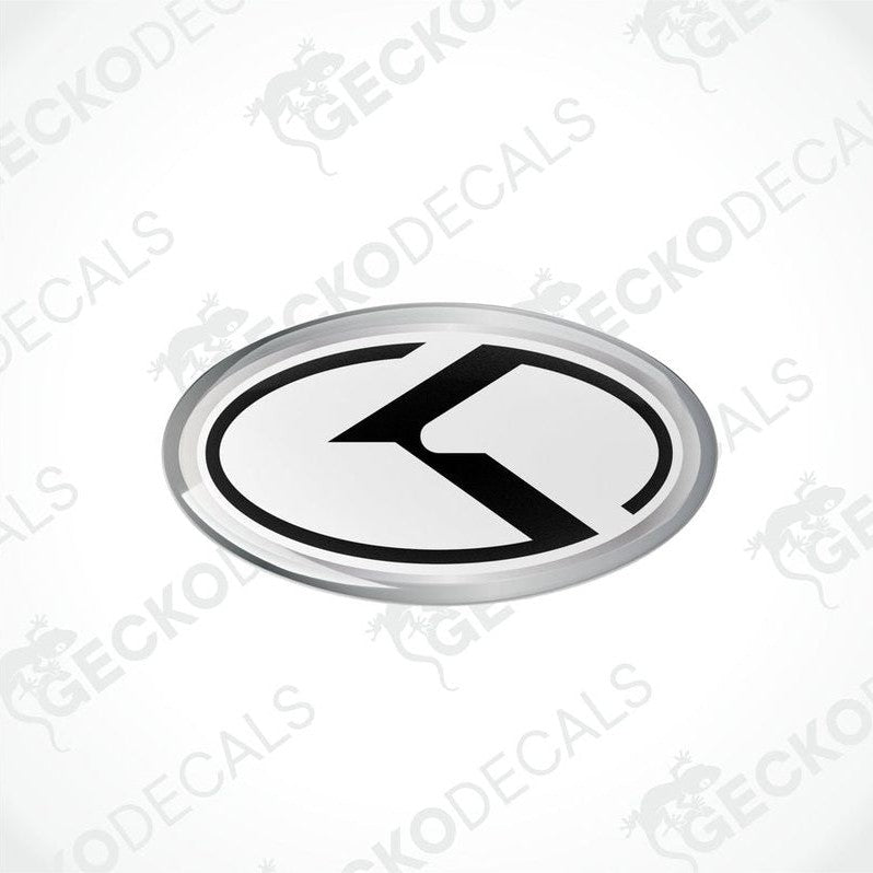 Oval vinyl stickers with a white and black design and the letter 'KIA' in the center, placed on a white background.