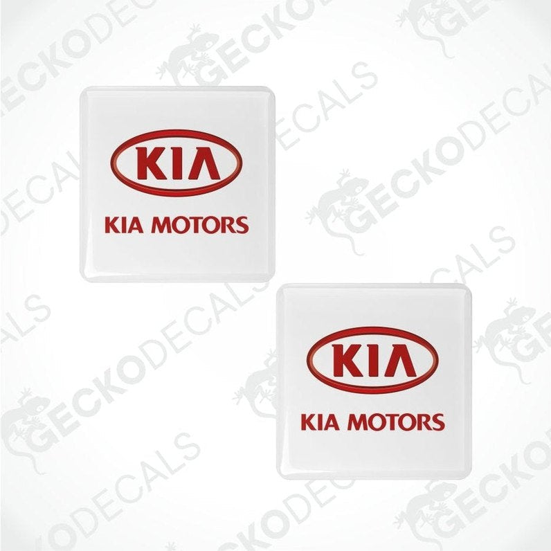 Two Kia Motors logo decal stickers on a white background with 'Gecko Decals' branding.