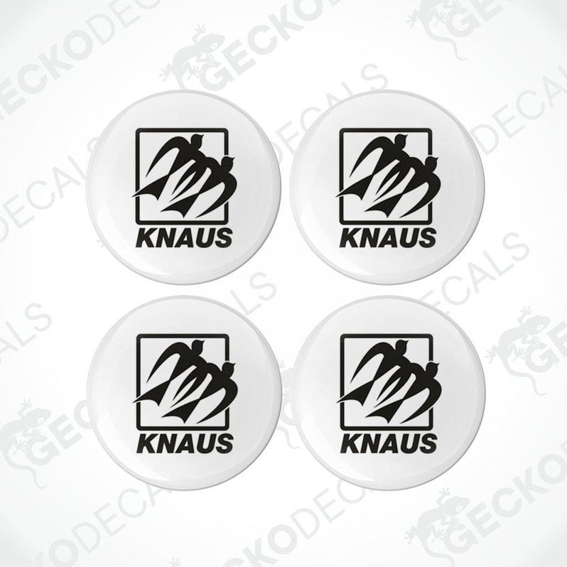A set of four white vinyl decals with a black and red scorpion design and the brand name 'KNAUS' printed on them.