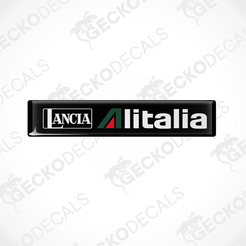 Black vinyl stickers with green and red geometric patterns and the text 'LANCIA ALITALIA' printed on them.