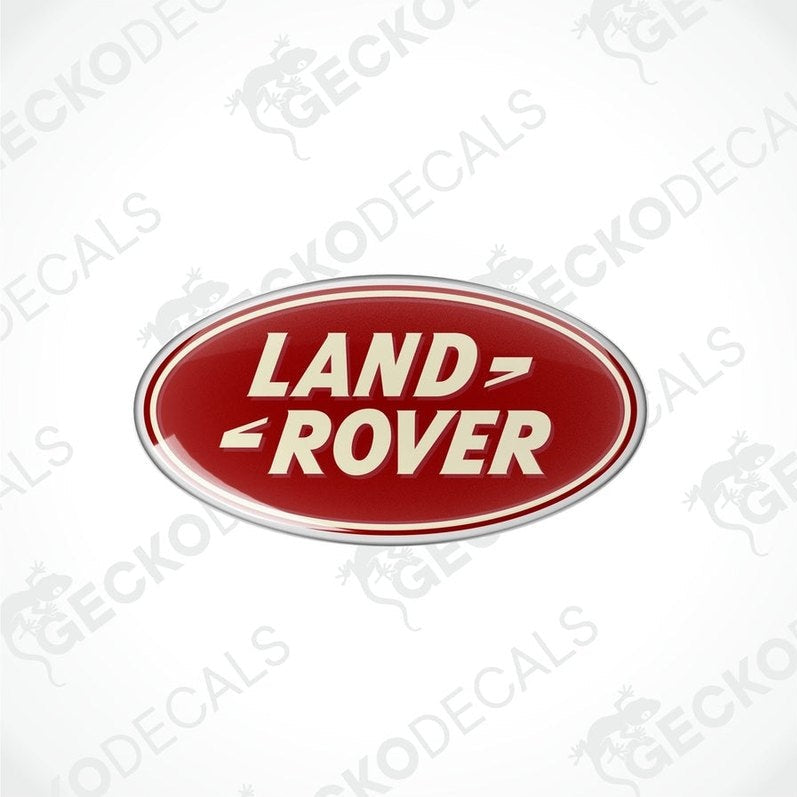 Red, silver, and white oval-shaped vinyl decals with the text 'LAND ROVER' on them.