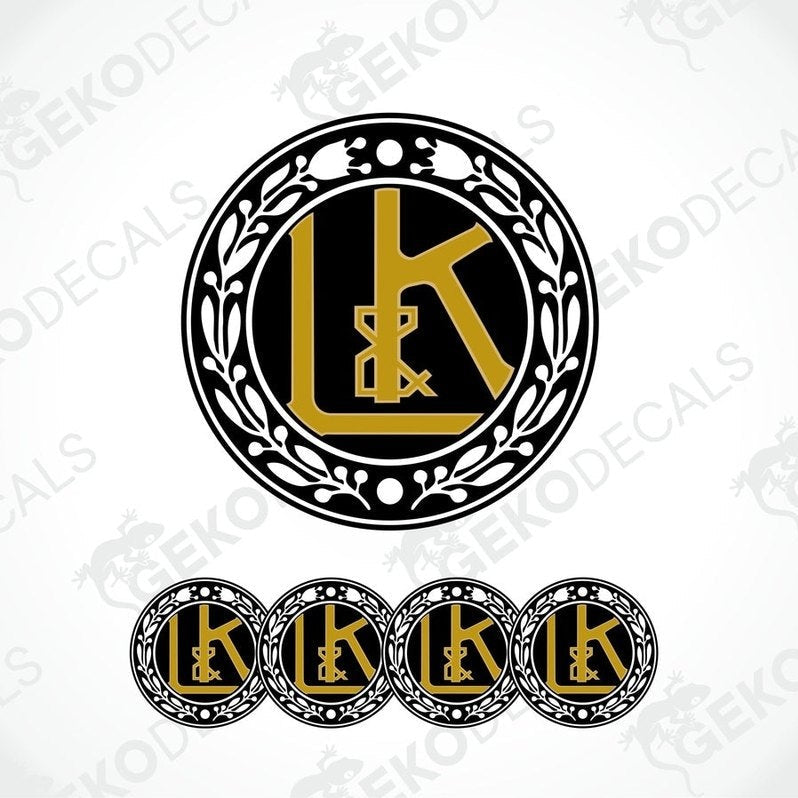 A set of four circular vinyl decals with a polyurethane coating featuring the LAURIN & KLEMENT logo in black, gold, and white colors.