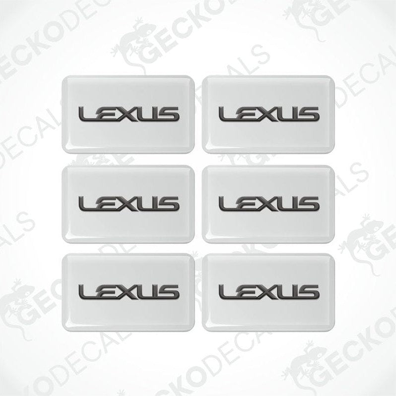 A set of six white vinyl decals with the LEXUS logo in grey.