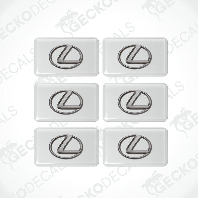 A set of six white vinyl decals with the LEXUS logo in silver.