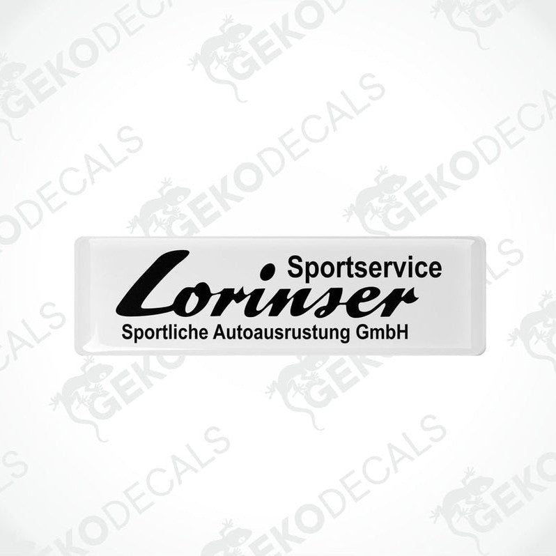 White vinyl decals with black text that read 'Lorinser Sportservice Sportliche Autoausrustung GmbH'.