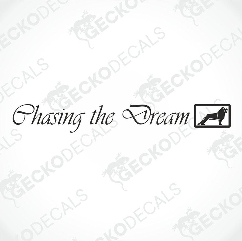 A die cut sticker with the phrase 'Chasing the Dream' displayed on the front of a gray truck.