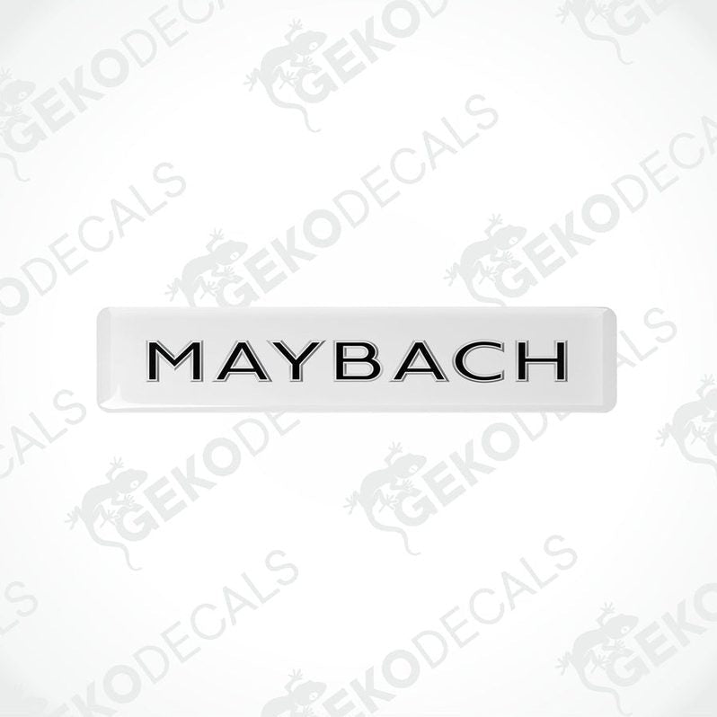 Rectangular white vehicle decals with the text 'MAYBACH' in capital letters