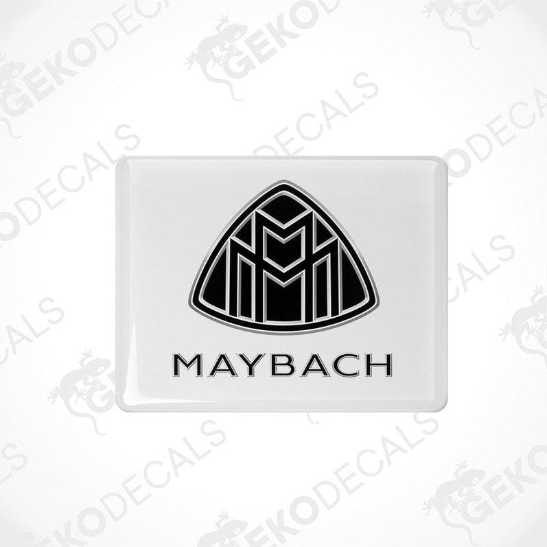 White vinyl stickers with a black geometric design representing the Maybach brand logo.