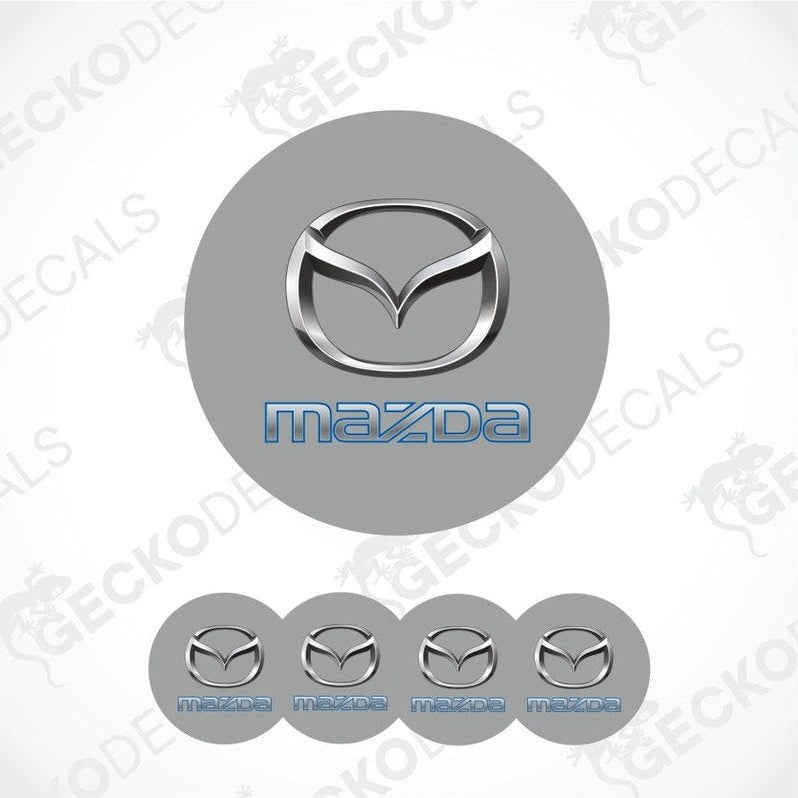 Mazda logo and brand name on gray background